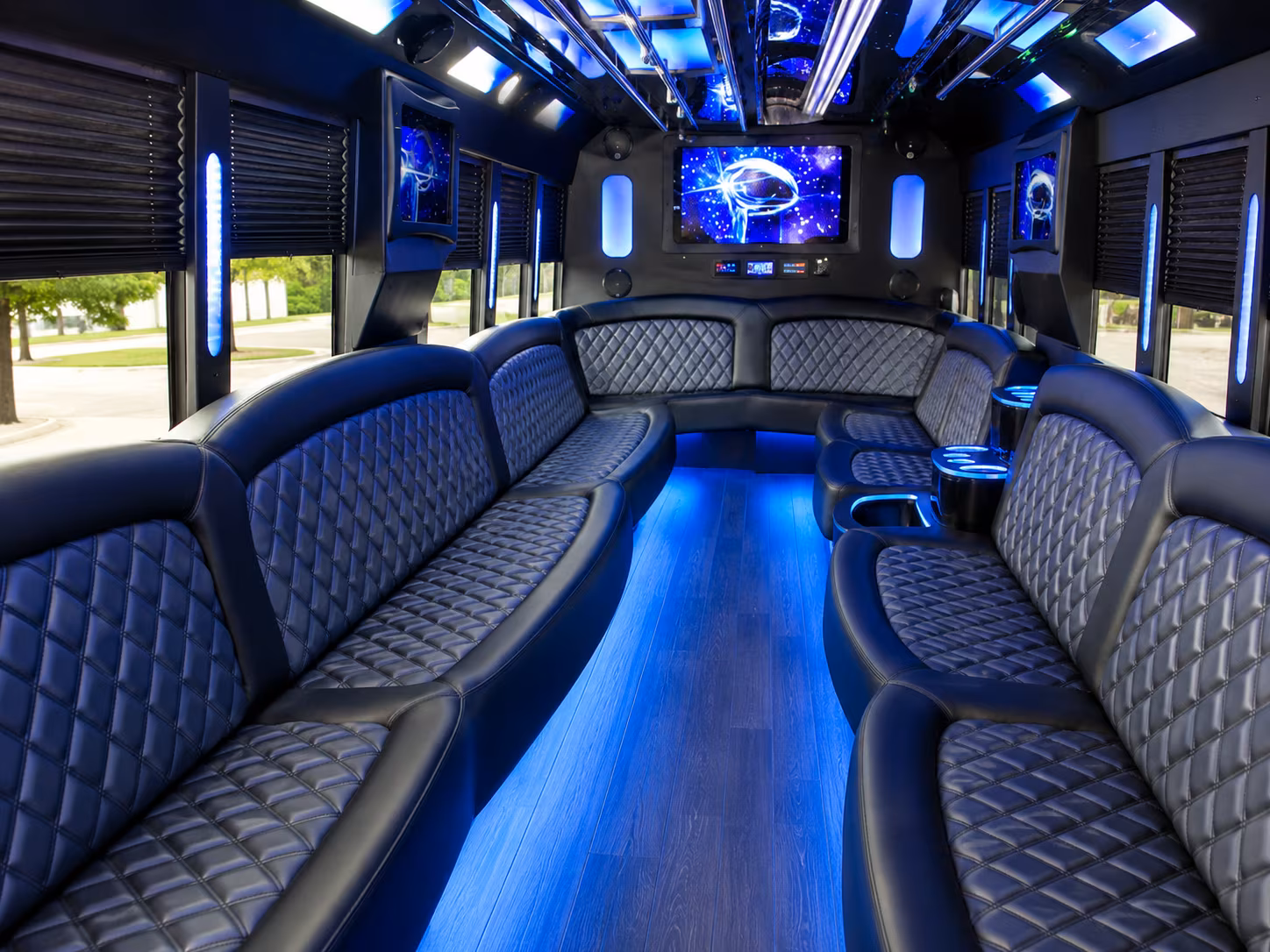 Wedding guests seated inside a party bus serving Phoenix